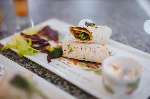 COMBO WRAP JAMÓN-QUESO/JUGO NARANJA/FRUTA